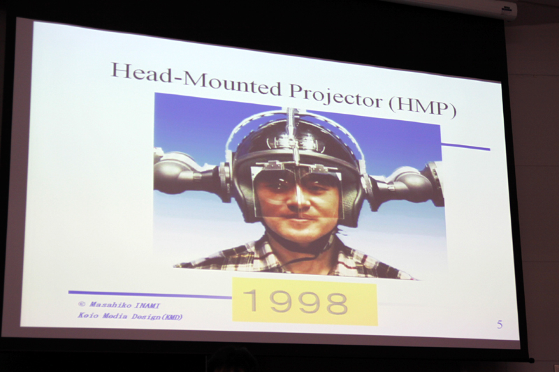 稲見氏の元祖ARシステム「Head-Mounted Projector」